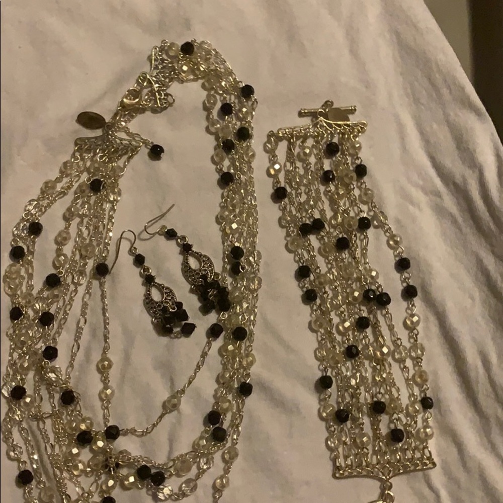 Matching necklace with its bracelet and earrings